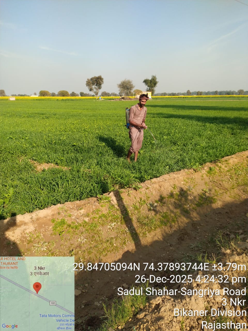 Farmer with spray equipment